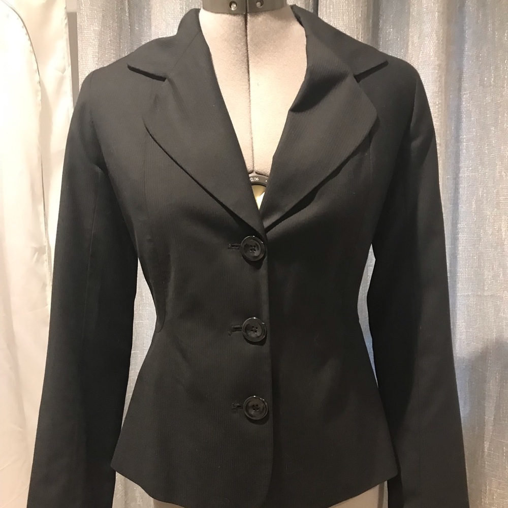 Black suit jacket and dress pants